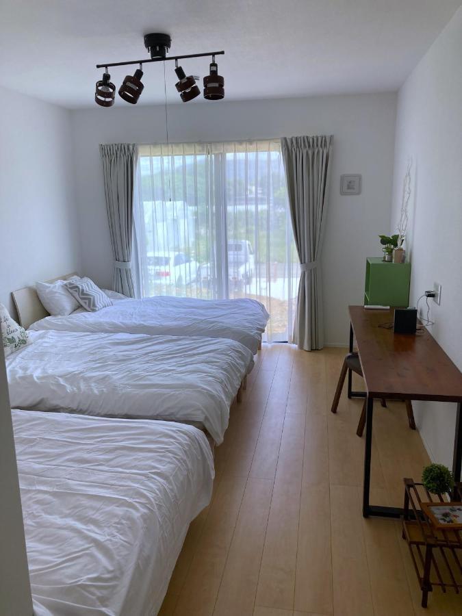 Nakijin Resort Guest House Exterior foto